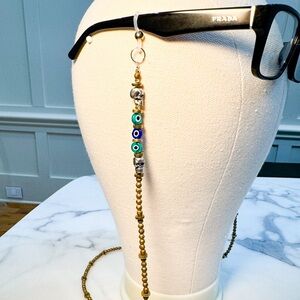 Blown-glass Evil-eye and skull handmade glasses chain